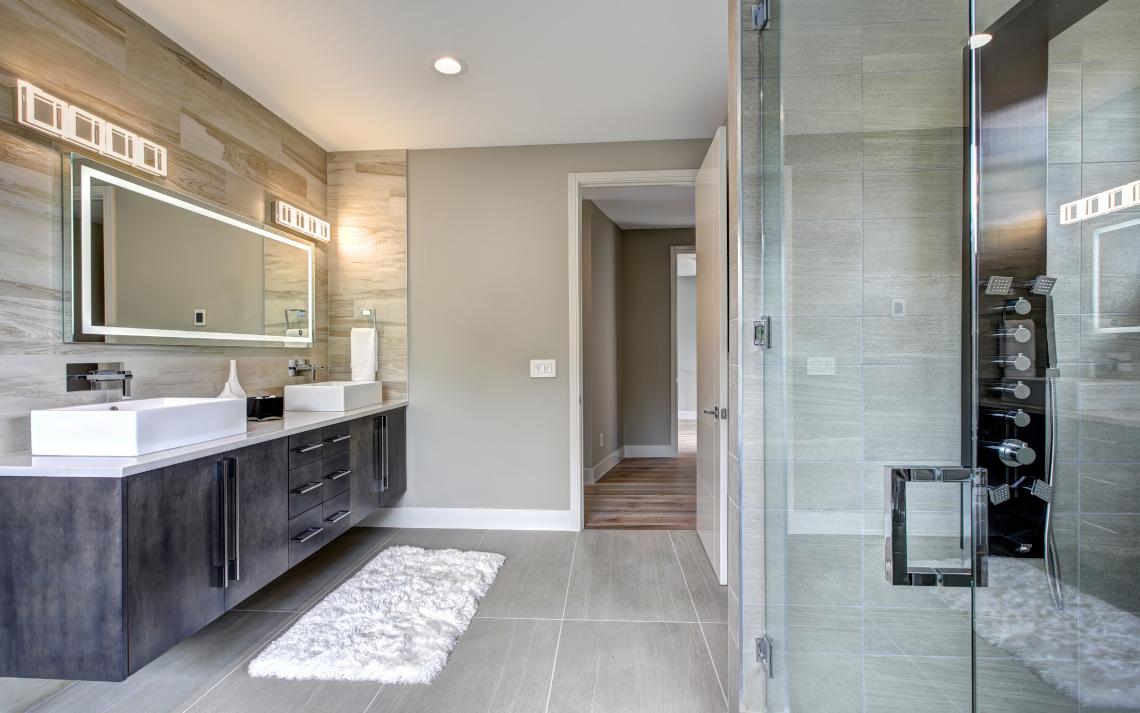 Luxury bathroom with modern vanity and walk-in shower