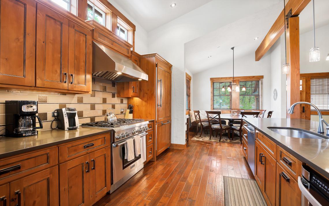 The brown cabinets and brown hardwood floors