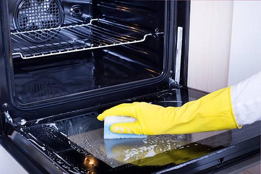 cleaning an oven 