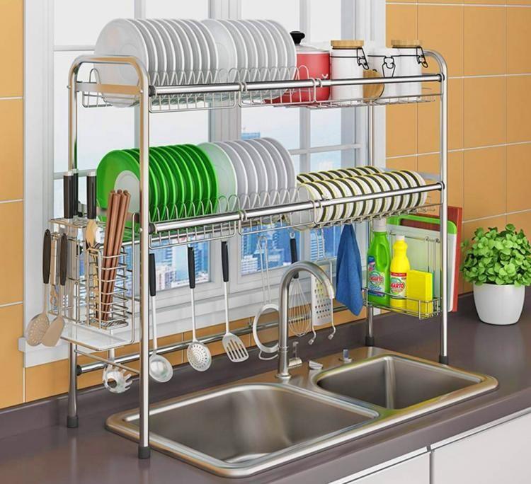 Install the dish drying rack on the wall against your sink