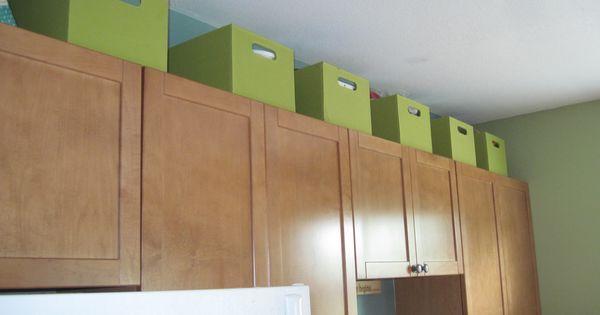 cabinet tops as kitchen storage spaces.