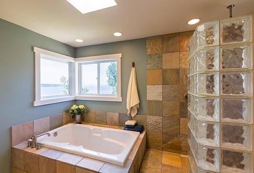 Photo 2: Contemporary upscale home spa bathroom interior with acrylic soaking tub