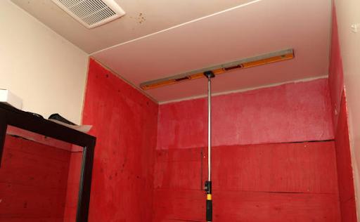 Low angle view of a bathroom renovation in a small house.