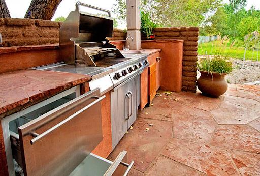 Outdoors Kitchen with Built-In gas grill on a deck