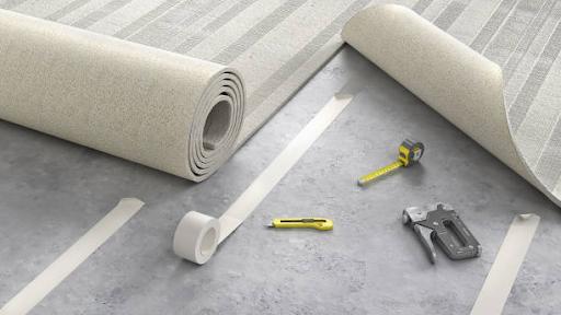 process of laying beige carpeton floor