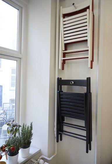 Hang the fold chairs and table when not in use